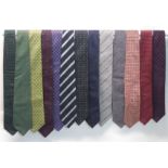 A COLLECTION OF SIXTEEN LOEWE SILK TIES of varying designs and two other silk ties (18) Condition