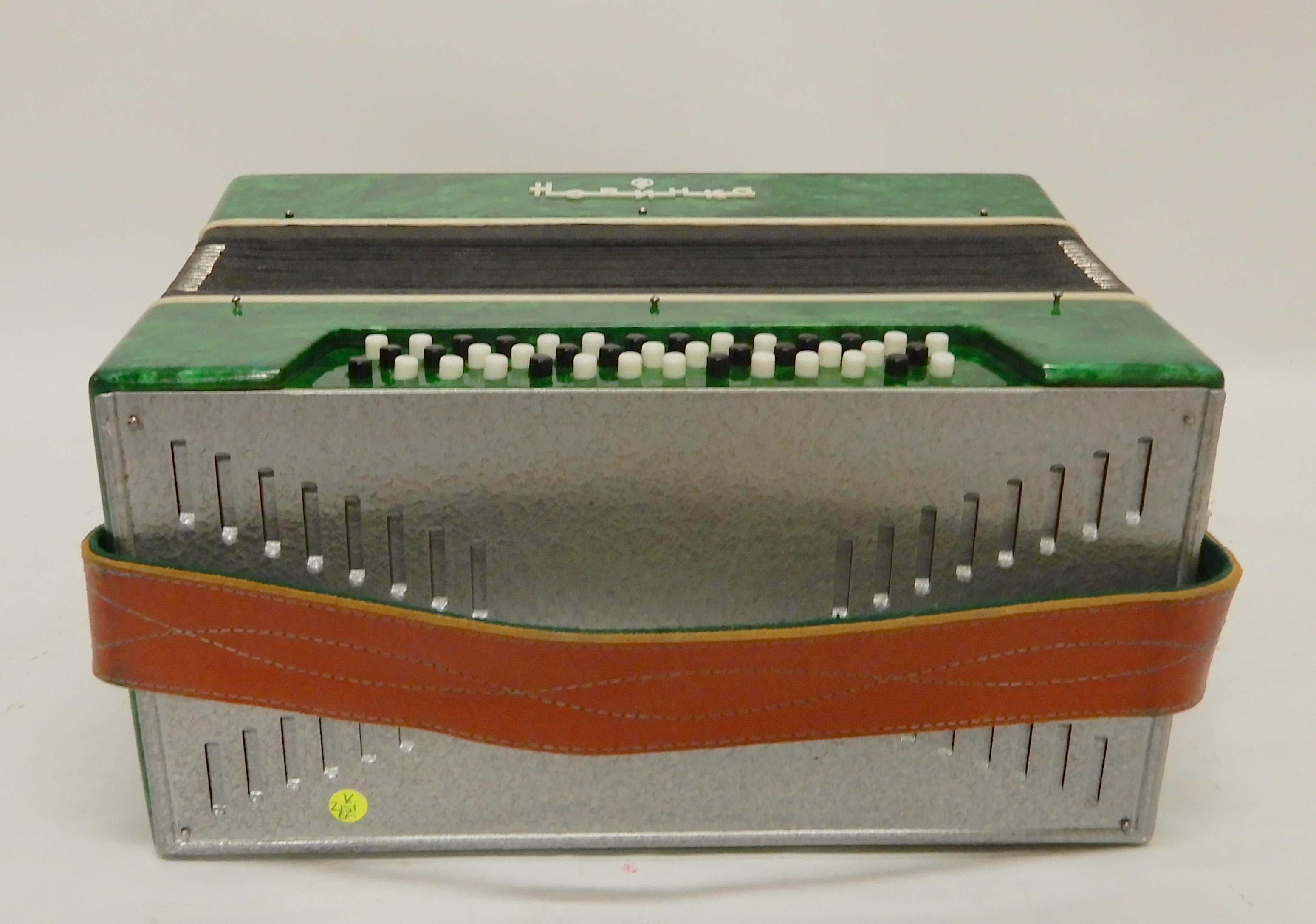 A Russian "Novelty" 43 x 41 button accordion in green Condition Report: Available upon request - Image 4 of 5