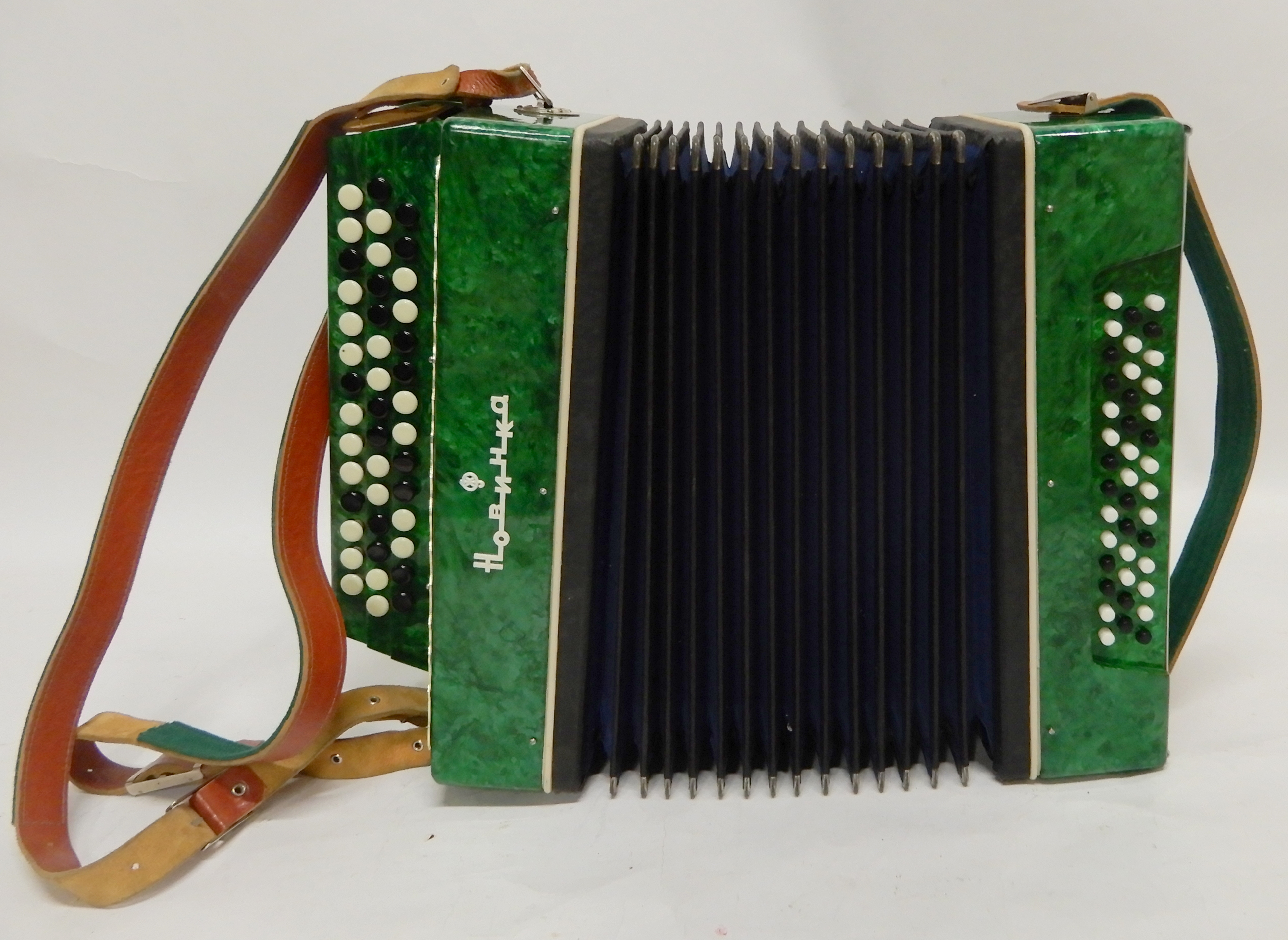 A Russian "Novelty" 43 x 41 button accordion in green Condition Report: Available upon request - Image 2 of 5