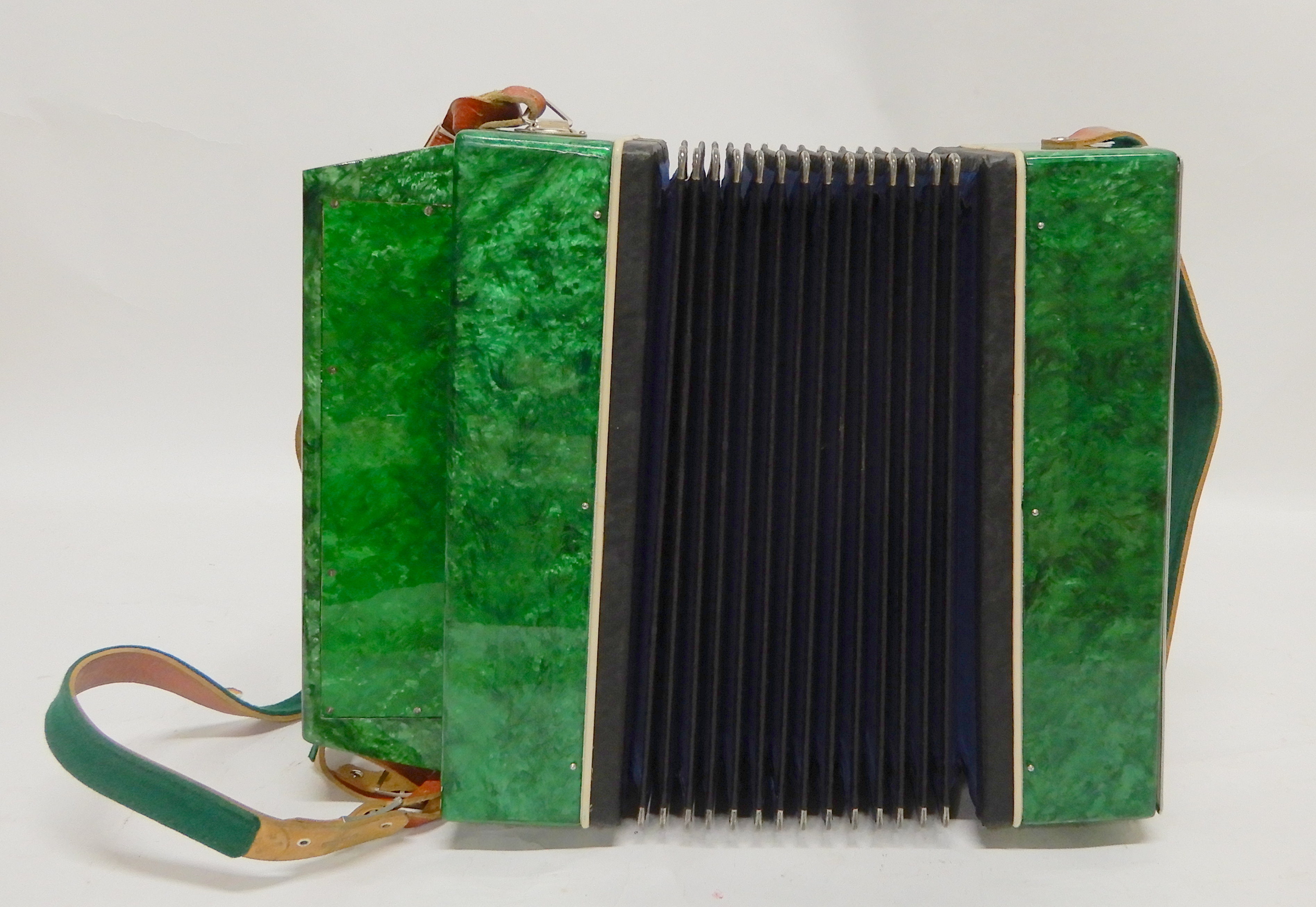 A Russian "Novelty" 43 x 41 button accordion in green Condition Report: Available upon request - Image 3 of 5