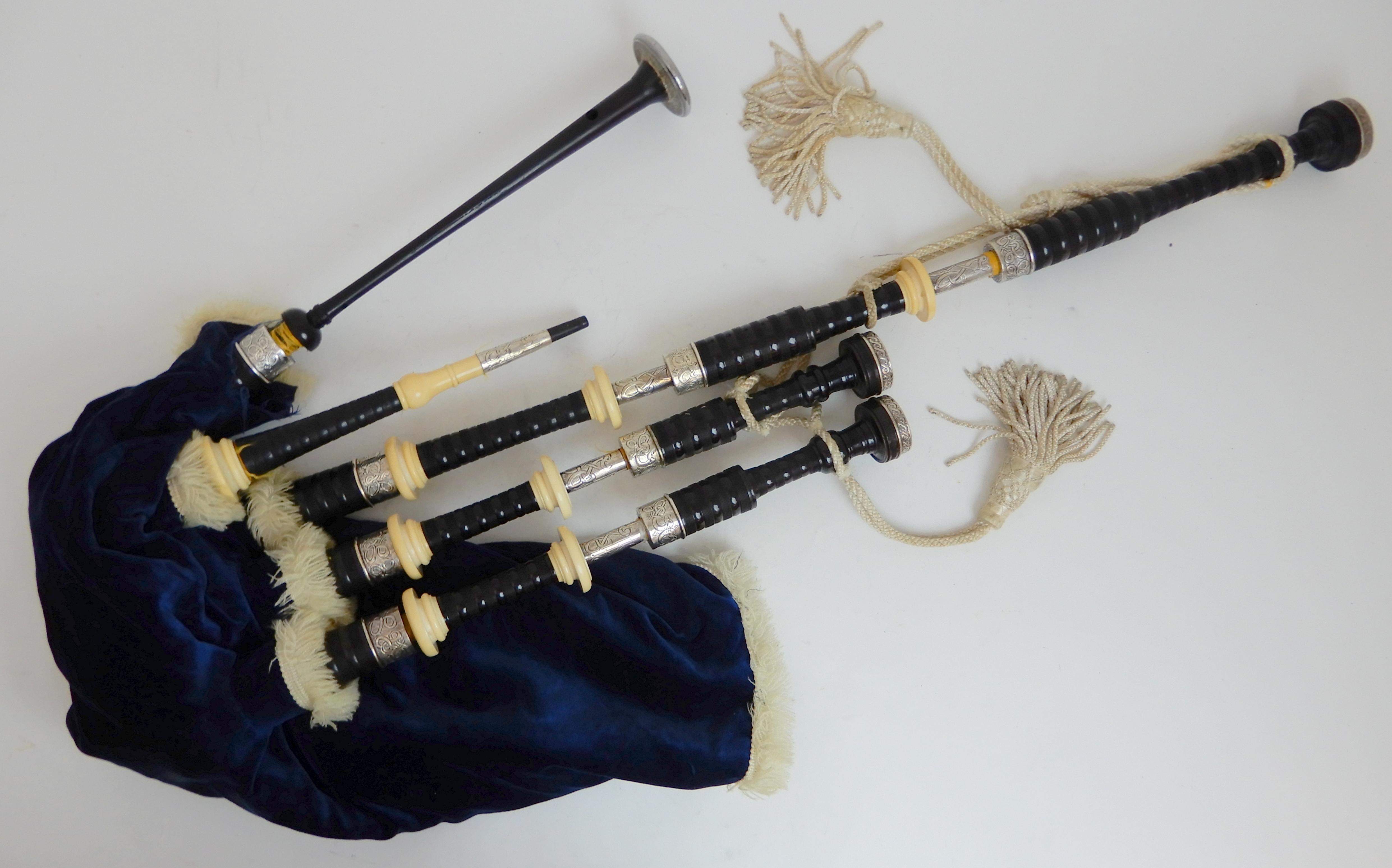 A full set of Scottish highland bagpipes by R G Hardie with celtic knotted silver and ivory mounts