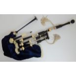 A full set of Scottish highland bagpipes by R G Hardie with celtic knotted silver and ivory mounts