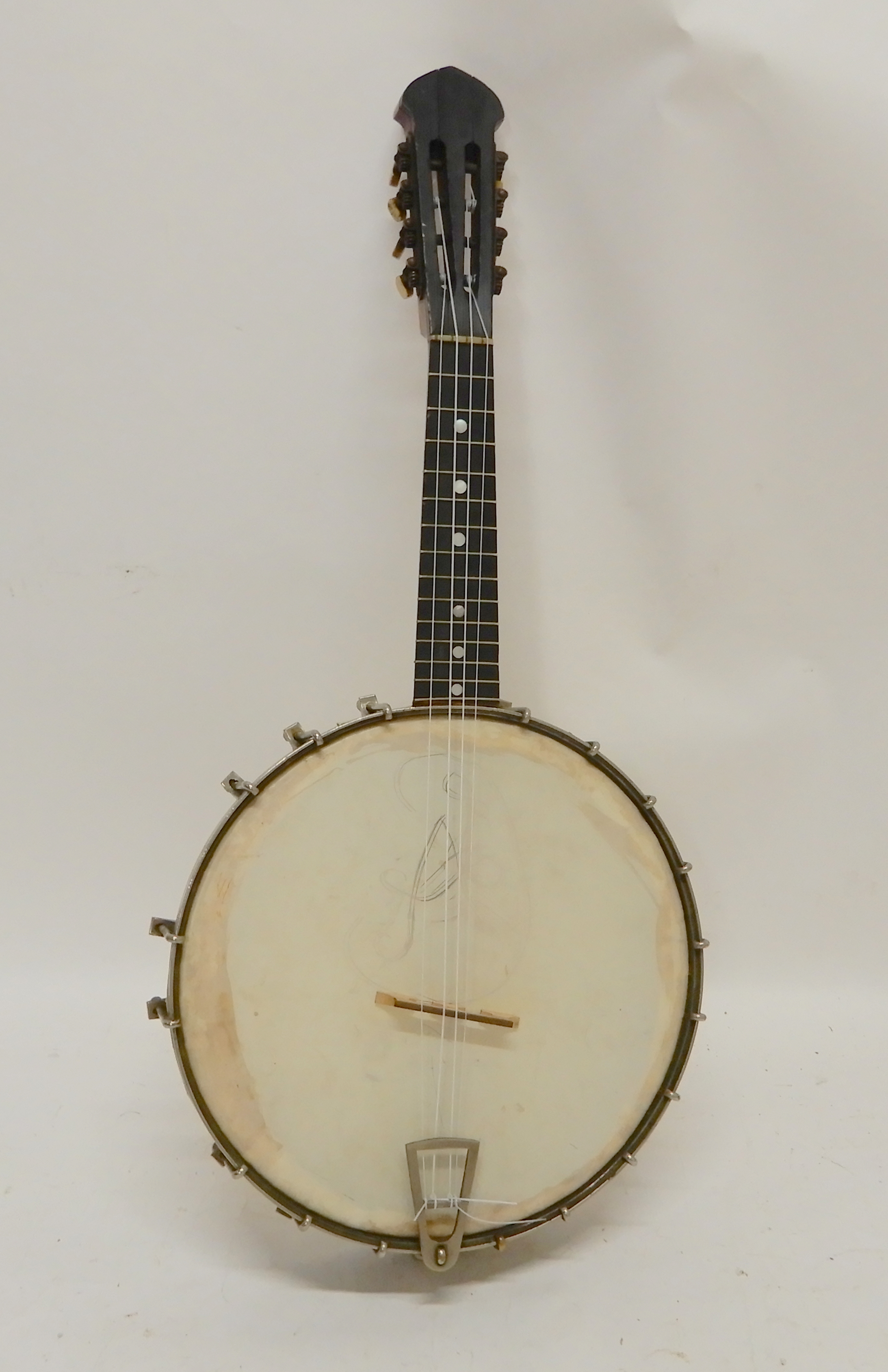 An eight string banjolele Condition Report: Available upon request