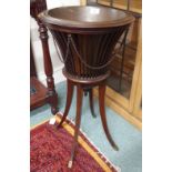 A reproduction mahogany planter with brass liner Condition Report: Available upon request