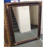 A large modern wall mirror, 145cm x 115cm Condition Report: Available upon request