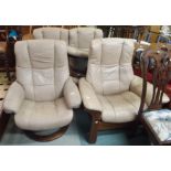 An Ekorness Stressless four piece leather suite comprising sofa, two chairs and a footstool (4)