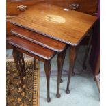 A mahogany nest of tables with golfer inlay Condition Report: Available upon request