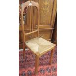 A French Art Nouveau chair with rush seat Condition Report: Available upon request