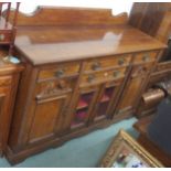 A carved oak sideboard, 101cm high x 175cm wide Condition Report: Available upon request