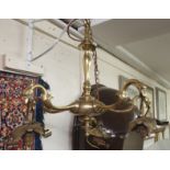 A five branch brass chandelier with glass shades, 62cm wide Condition Report: Available upon