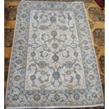 A light ground Keshan rug with allover floral design, 165cm x 115cm Condition Report: Available upon