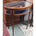 An inlaid mahogany oval bijouterie table, 74cm high x 66cm wide x 43cm deep Condition Report: