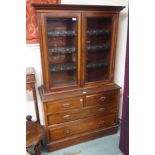 A mahogany two over two chest of drawers and a mahogany bookcase top (2) Condition Report: Available