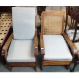 A pair of Art Deco style armchairs with cane backs (2) Condition Report: Available upon request