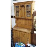 A pine kitchen dresser, 200cm high x 95cm wide Condition Report: Available upon request