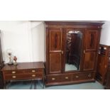 An Edwardian mahogany inlaid wardrobe with central mirror and two lower drawers, 213cm high x