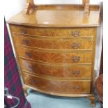 A walnut five drawer bow front chest, 97cm high x 85cm wide Condition Report: Available upon