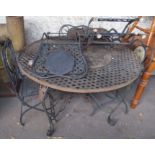 A circular metal garden table and chairs and a garden bench (af) Condition Report: Available upon