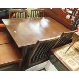 A mid-Century sideboard with four drawers over drop front flanked by two doors on stand, 78cm high x