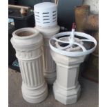 Three chimney pots and a cast iron wheel (4) Condition Report: Available upon request