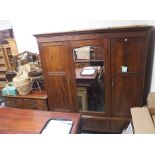 A mahogany wardrobe with central mirror 206cm high x 190cm wide and a matching dressing chest (2)