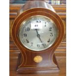 A mahogany inlaid mantle clock and an oak barometer (2) Condition Report: Available upon request