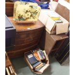 A bow front chest of drawers, table mirrors books etc Condition Report: Available upon request