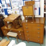 A Lebus mid-Century dressing table, chest of drawers, stool, bedside cabinet, teak nest of tables