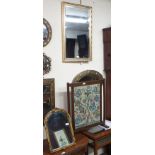 An oak framed tapestry firescreen and two gilt mirrors (3) Condition Report: Available upon request