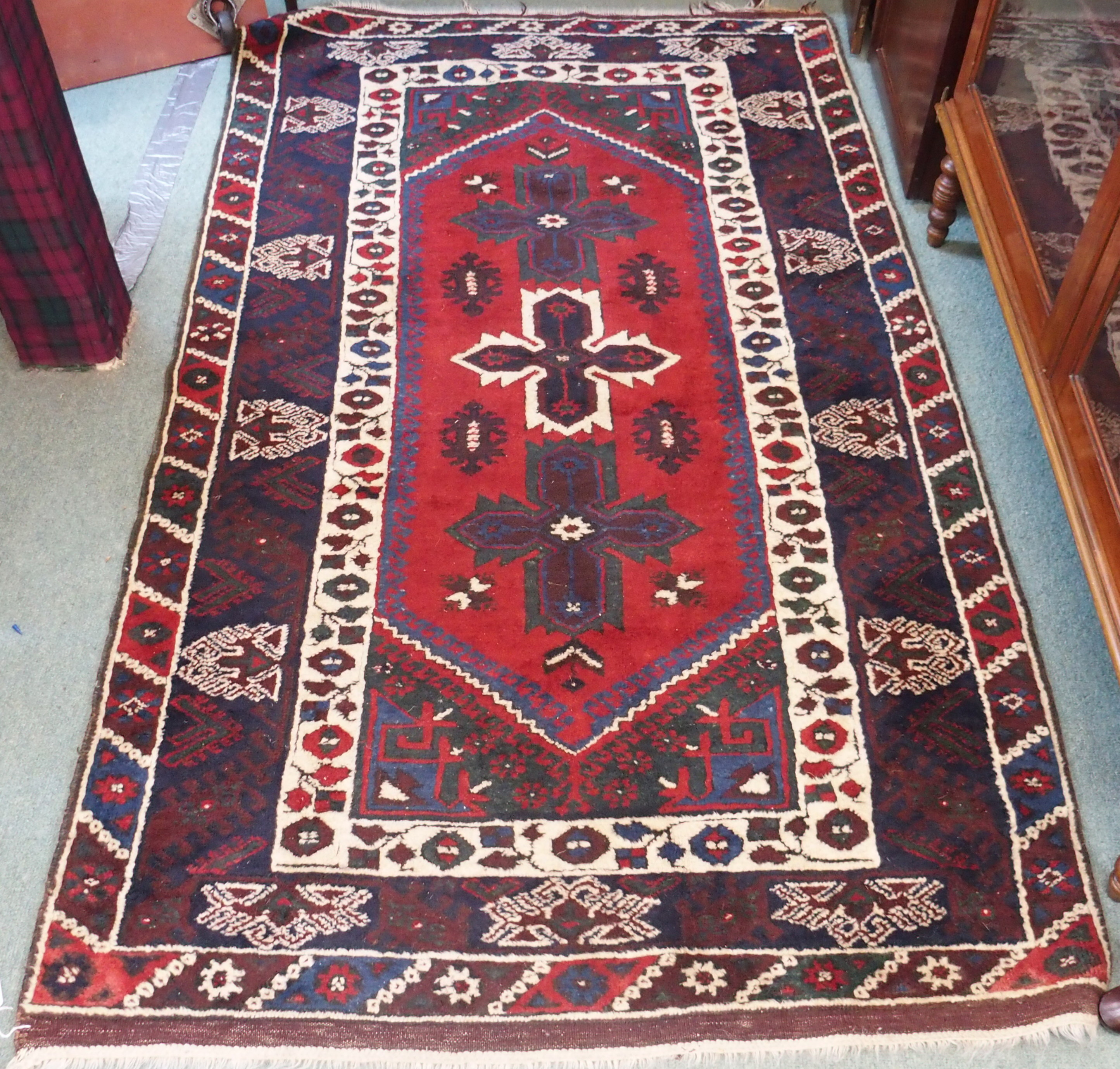 A red ground Eastern rug, 204cm x 120cm, a wool rug, 160cm x 122cm, a Chinese style rug, two