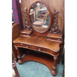 A Victorian mahogany dressing table with oval mirror, 153cm high x 112cm wide Condition Report: