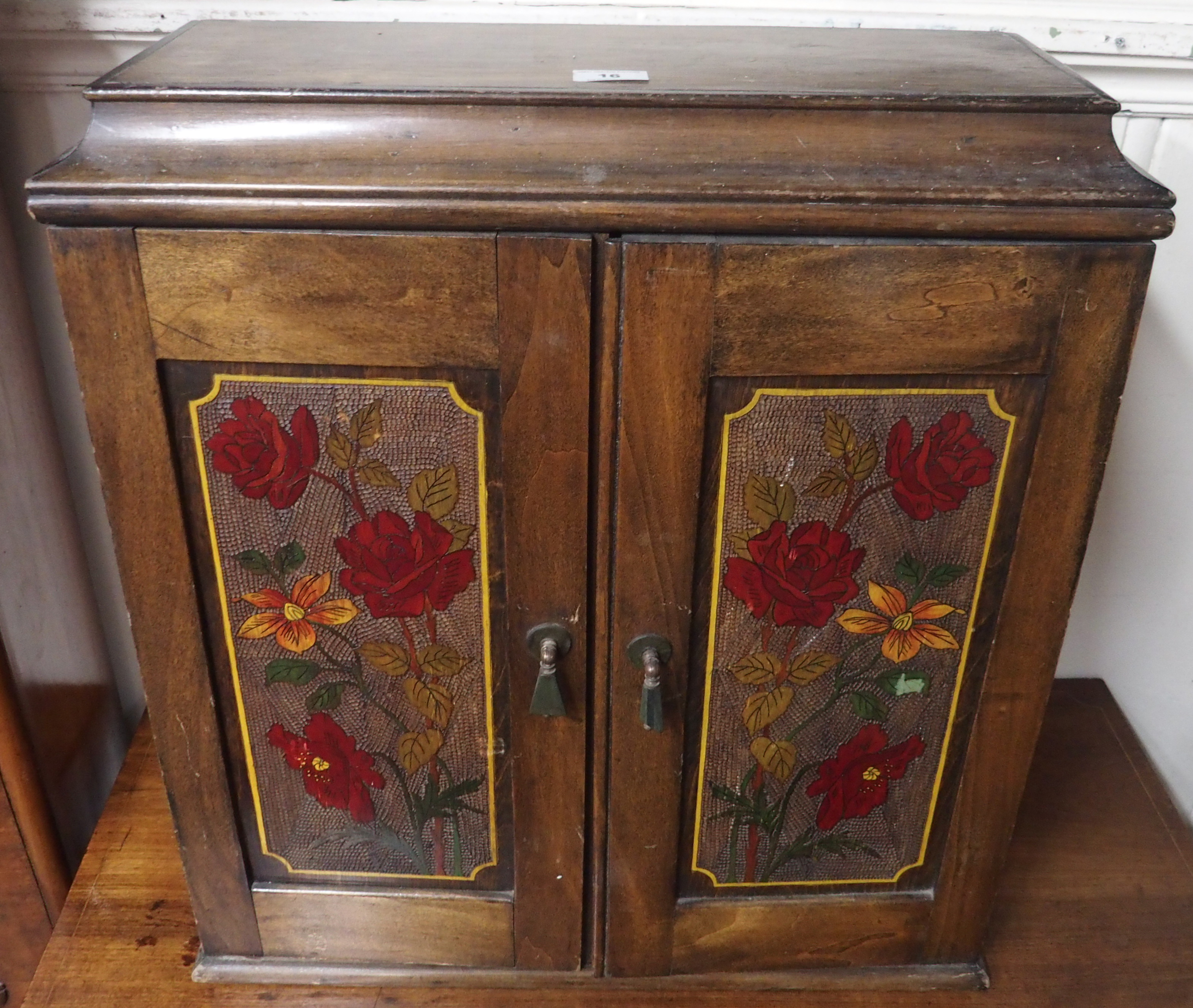 A poker work wall cabinet, 64cm high x 57cm wide Condition Report: Available upon request