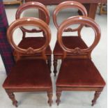 A set of four Victorian mahogany balloon back chairs (4) Condition Report: Available upon request