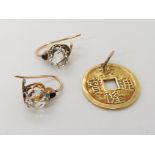 A yellow metal Chinese coin and a pair of yellow metal mounted rock crystal earrings, combined
