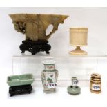 A soapstone libation cup, two miniature vases, a celadon glazed dish and two ivory items Condition