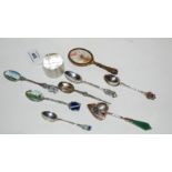 A lot comprising a silver napkin ring, a small mirror and assorted teaspoons Condition Report: