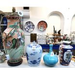 A large Chinese vase lamp, a blue and white pottery jar and cover, and two other vases Condition