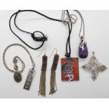 A silver Ola Gorie stylized cross pendant, a silver ingot pendant and other items Condition