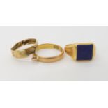 An 18ct gold lapis lazuli set signet ring size M, and 18c wedding band with attached loop and a