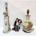 A Royal Doulton figure The Balloon Man, a Nao lamp base and another table lamp Condition Report:
