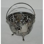 A Victorian silver sugar basket, London 1872 lacking glass liner, 10cm high, 245gms Condition