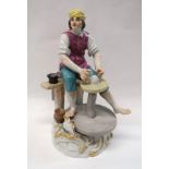 A Meissen figure of a potter with crossed swords mark to base, 19.5cm high Condition Report: