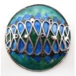 A white metal and enamel brooch in the manner of Norman Grant, no hallmarks Condition Report: Not