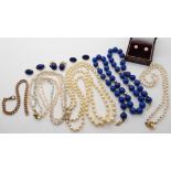 A string of lapis lazuli beads with a 9ct clasp and beads, strings of cultured pearls all with 9ct
