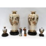 A pair of satsuma vases, two smaller vases and two figures Condition Report: Available upon request