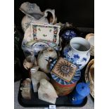 A Claire Barrett pottery dish, a sun face tile, other studio pottery, pottery ewer etc