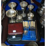 A lot comprising two tray lots of EP - goblets, tray, cutlery etc Condition Report: Available upon