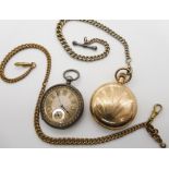 A white metal pocket watch together with a gold plated Waltham, both watches af, with base metal fob