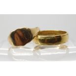 An 18ct gold wedding ring size Q, weight 4.2gms, and a 9ct gold signet ring size O1/2, weight 2.5gms