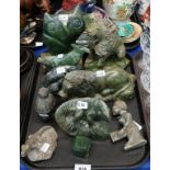 A collection of African green hardstone sculptures mainly animals Condition Report: Available upon
